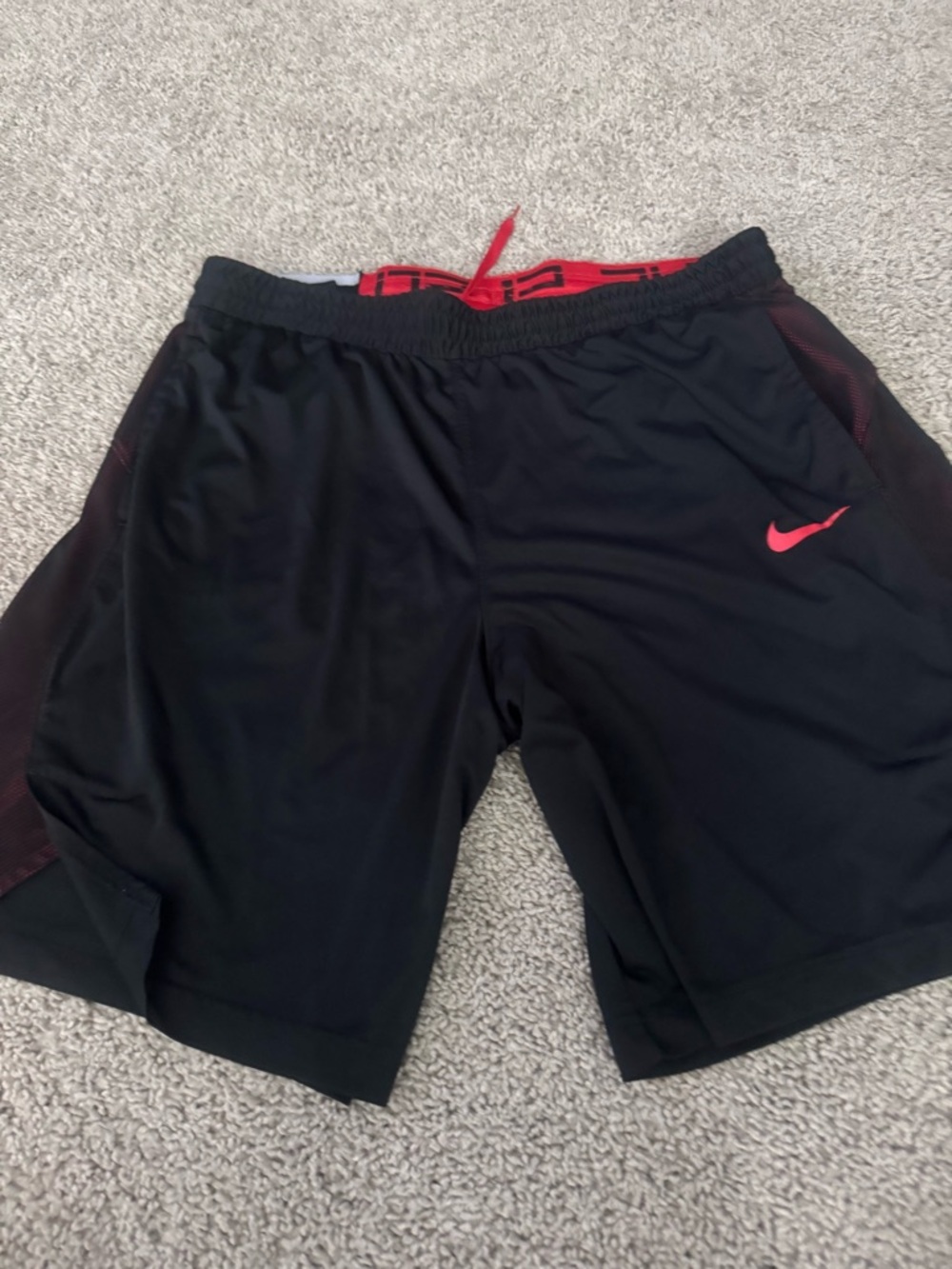 Nike Men’s Black Athletic Shorts with Red Swoosh and Waistband